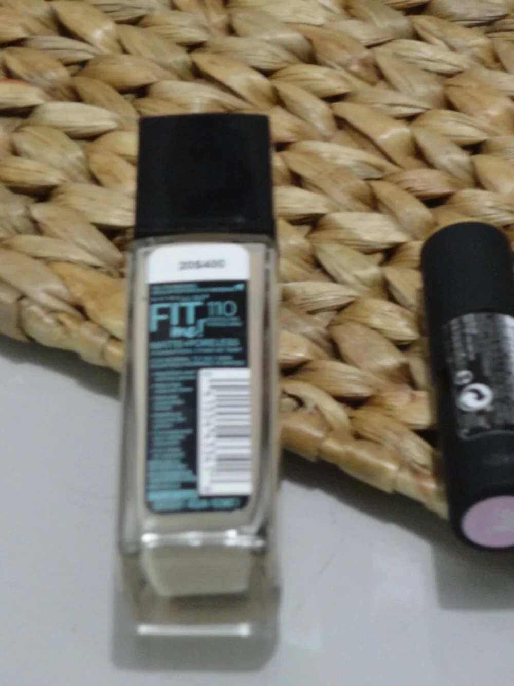 Maybelline Fit Me Matte + Poreless Foundation and Revlon lipstick.